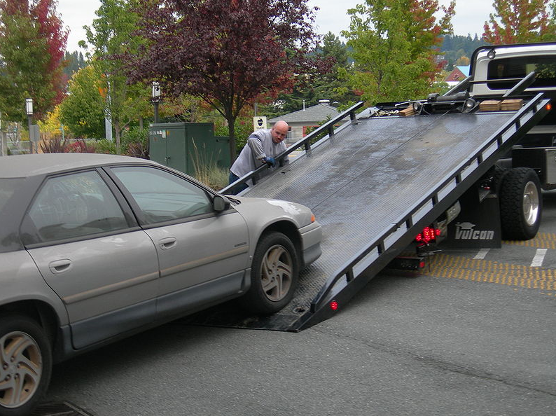 this image shows flatbed towing services in Soldotna, AK